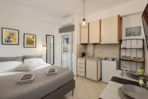 En eller flere senger på et rom på Central Studio! Fiber WiFi, AC, Private, Self Check-in!
