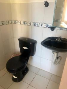 Koupelna v ubytování Hotel Santorini
