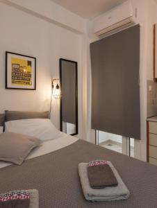 En eller flere senger på et rom på Central Studio! Fiber WiFi, AC, Private, Self Check-in!