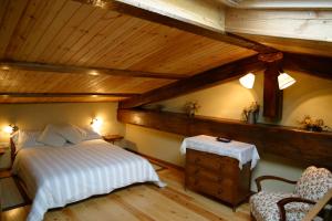 Кровать или кровати в номере Casa rural calRei