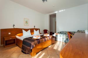 Postelja oz. postelje v sobi nastanitve Guesthouse Villa Adria