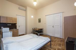 A bed or beds in a room at Riverside City