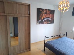 Łóżko lub łóżka w pokoju w obiekcie Apartament Centrum