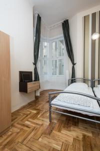 A bed or beds in a room at Riverside City