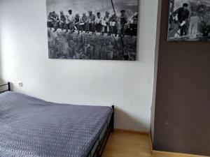 Łóżko lub łóżka w pokoju w obiekcie Apartament Centrum