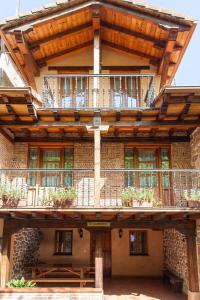 an external view of a building with a balcony at Casa El Campano in Ontaneda