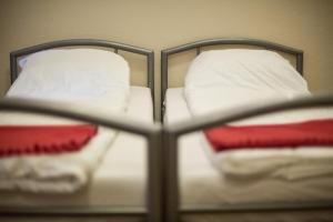 A bed or beds in a room at Riverside City