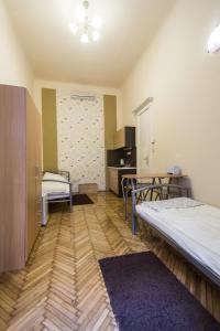 A bed or beds in a room at Riverside City
