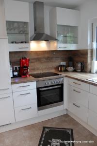 Kuchyňa alebo kuchynka v ubytovaní Ferienwohnung Loserblick + 20 fotografií