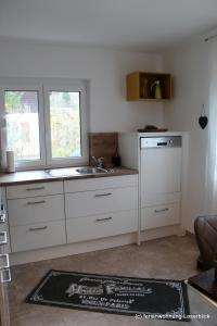 Kuchyňa alebo kuchynka v ubytovaní Ferienwohnung Loserblick