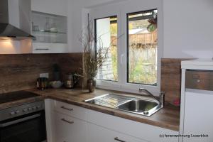 Kuchyňa alebo kuchynka v ubytovaní Ferienwohnung Loserblick
