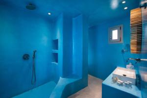 Kopalnica v nastanitvi Skyfall Suites - Adults Only