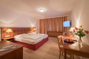 Letto o letti in una camera di Hotel Gasthof Mostwastl