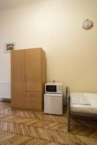 A bed or beds in a room at Riverside City
