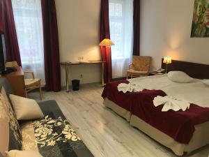 Postel nebo postele na pokoji v ubytování A1 Hotel Riga City Center