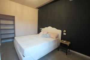 מיטה או מיטות בחדר ב-AGRITURISMO CORTE FONTANA