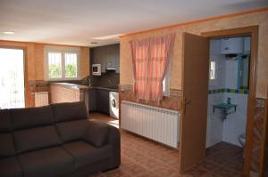 A kitchen or kitchenette at Apartamentos Matraca Még 26 kép