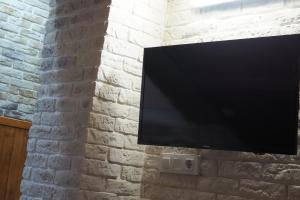 TV a/nebo společenská místnost v ubytování Tiny apartment on the roof touching Gibraltar