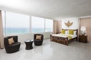 Postel nebo postele na pokoji v ubytování Calypso Beach Hotel