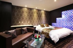Postel nebo postele na pokoji v ubytování Hotel Bijou (Adult Only)