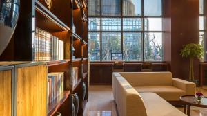 Area soggiorno di SSAW Boutique Hotel Ningbo CBD