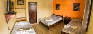 Ліжко або ліжка в номері Berakah B&B- Central Park