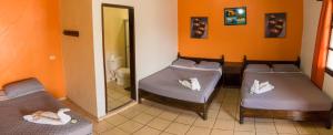 Ліжко або ліжка в номері Berakah B&B- Central Park