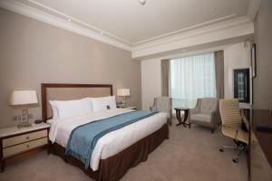 TV a/nebo společenská místnost v ubytování Jeurong Hotel Shanghai