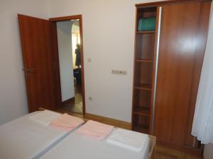 Ein Bett oder Betten in einem Zimmer der Unterkunft Apartments Marija