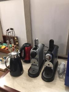 a counter top with a group of appliances on it at Relais de Bèze in Bèze