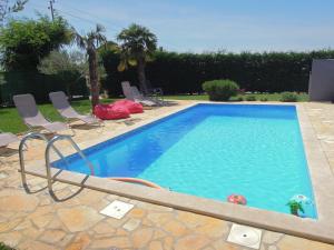 Bazén v ubytování Holiday Home Villa Ivan nebo v jeho okolí
