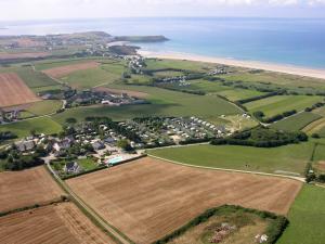 an aerial view of a village next to the ocean at Vacancéole - Résidence Les Terrasses de Pentrez-Plage in Pentrez