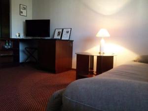 Postel nebo postele na pokoji v ubytování Inter Hotel