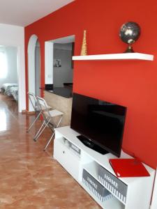 TV a/nebo společenská místnost v ubytování apartamento MAKTUB