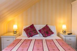 Cama o camas de una habitación en Menzies Guest House