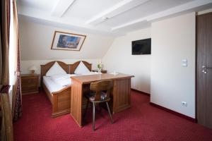 TV a/nebo společenská místnost v ubytování Hotel-Burghagen