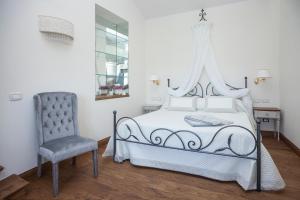 Postel nebo postele na pokoji v ubytování Podere La Contessa B&B