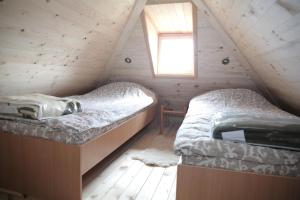Giường trong phòng chung tại Etno Milikina ravan