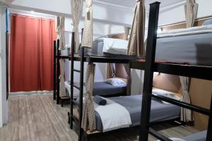 Ein Bett oder Betten in einem Zimmer der Unterkunft Tangmo House