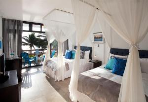 Voodi või voodid majutusasutuse Palmazul Hotel & Spa toas