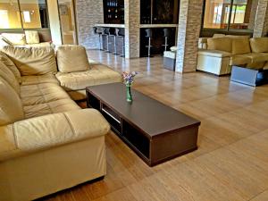Χώρος καθιστικού στο Prestige Hotel Suites