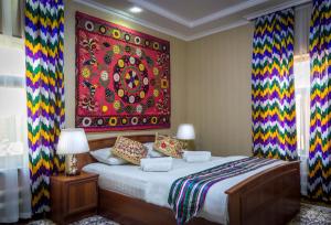Cama o camas de una habitación en Jahongir Hotel