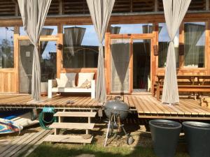 Patio alebo iná vonkajšia časť ubytovania Seehaus Inselwelt