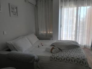 Postel nebo postele na pokoji v ubytování Complejo Minerva Jupiter