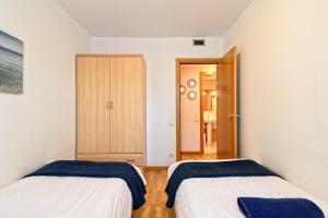 Posteľ alebo postele v izbe v ubytovaní Apartamento&piscina cerca de Barcelona
