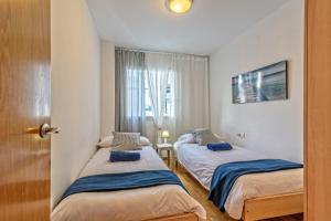 Posteľ alebo postele v izbe v ubytovaní Apartamento&piscina cerca de Barcelona