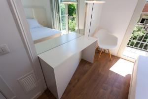 Posteľ alebo postele v izbe v ubytovaní Hostal Argo