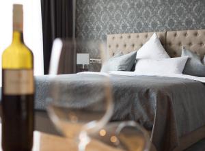 Postel nebo postele na pokoji v ubytování anders Kontorhaus Hotel