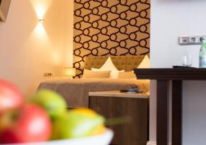 Postel nebo postele na pokoji v ubytování anders Kontorhaus Hotel