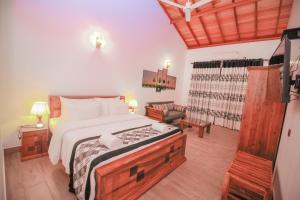 Postel nebo postele na pokoji v ubytování Villa Paradise